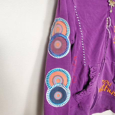 MAWA1 - Purple embroidered zip up hoodie. Size medium (approx size 10)