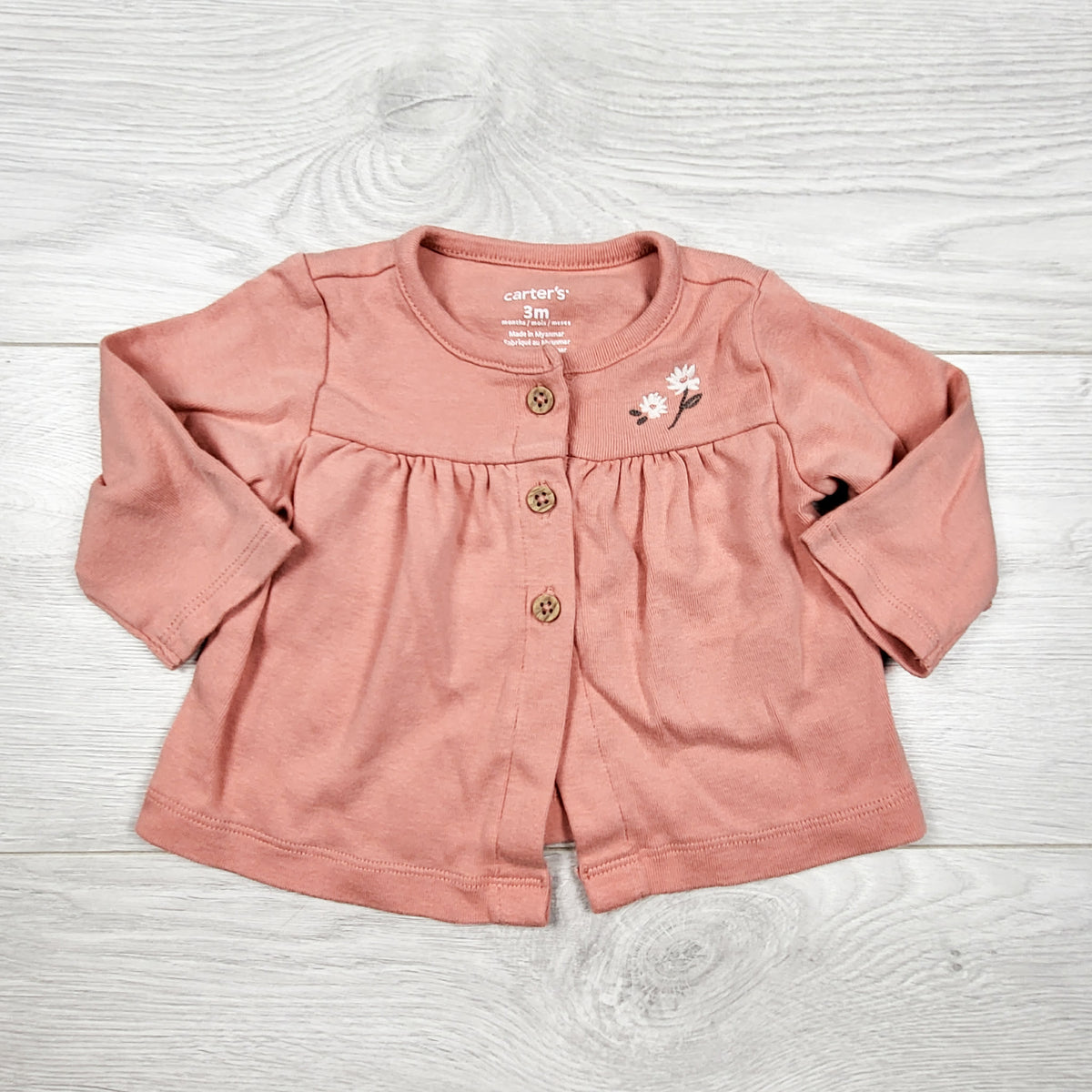 Carters pink button top with embroidered flowers. Size 3 months