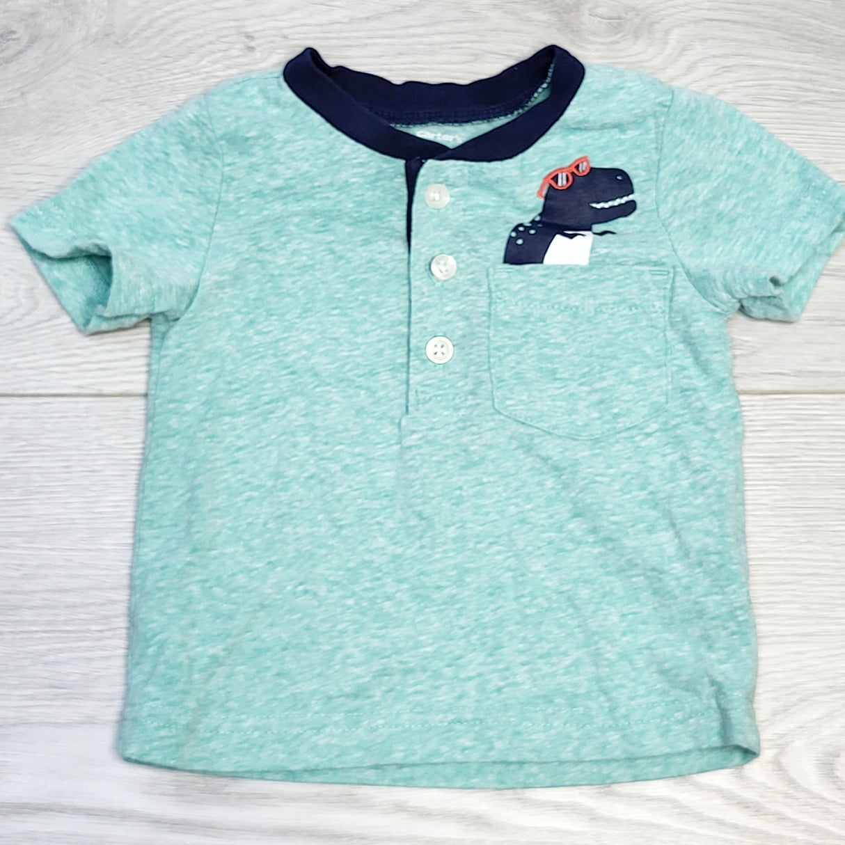 CHOL1 - Carters turquoise t-shirt with dinosaur, size 6 months