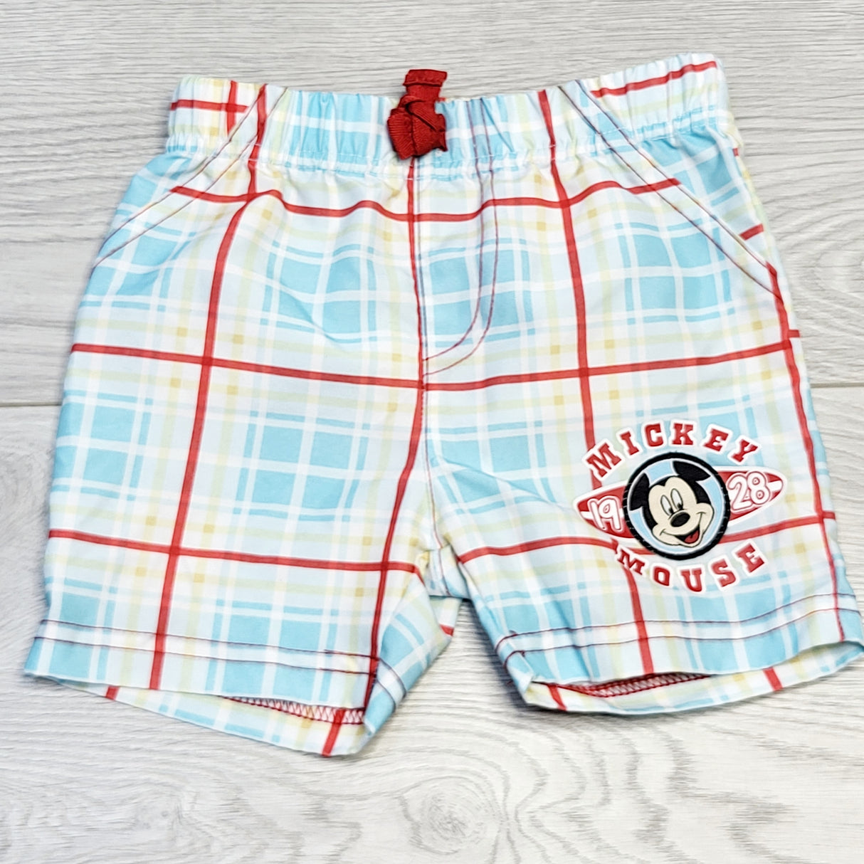 CHOL1 - Disney plaid Mickey Mouse swim shorts, size 3-6 months