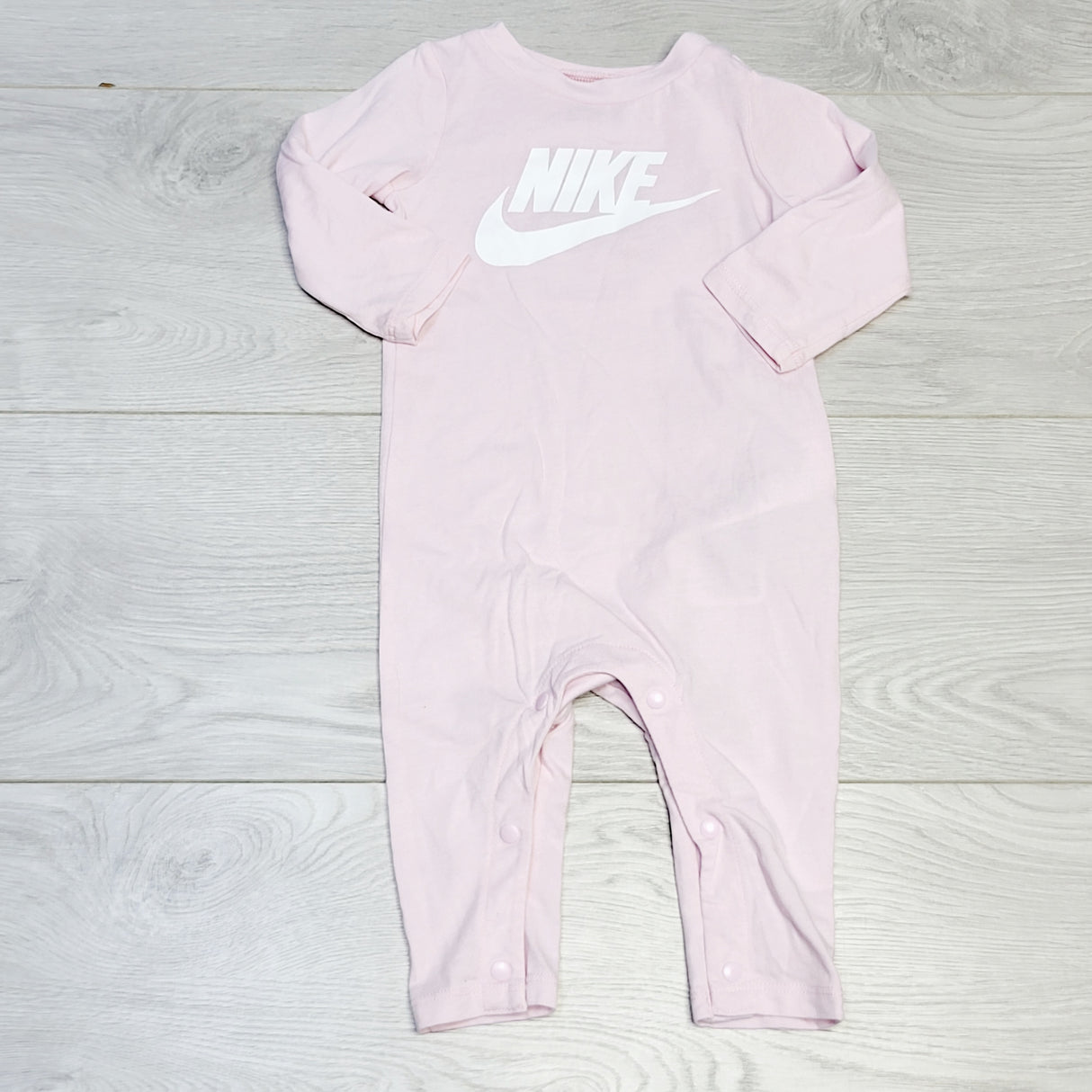 COWN1 - Nike pink cotton romper.  Size 6 months