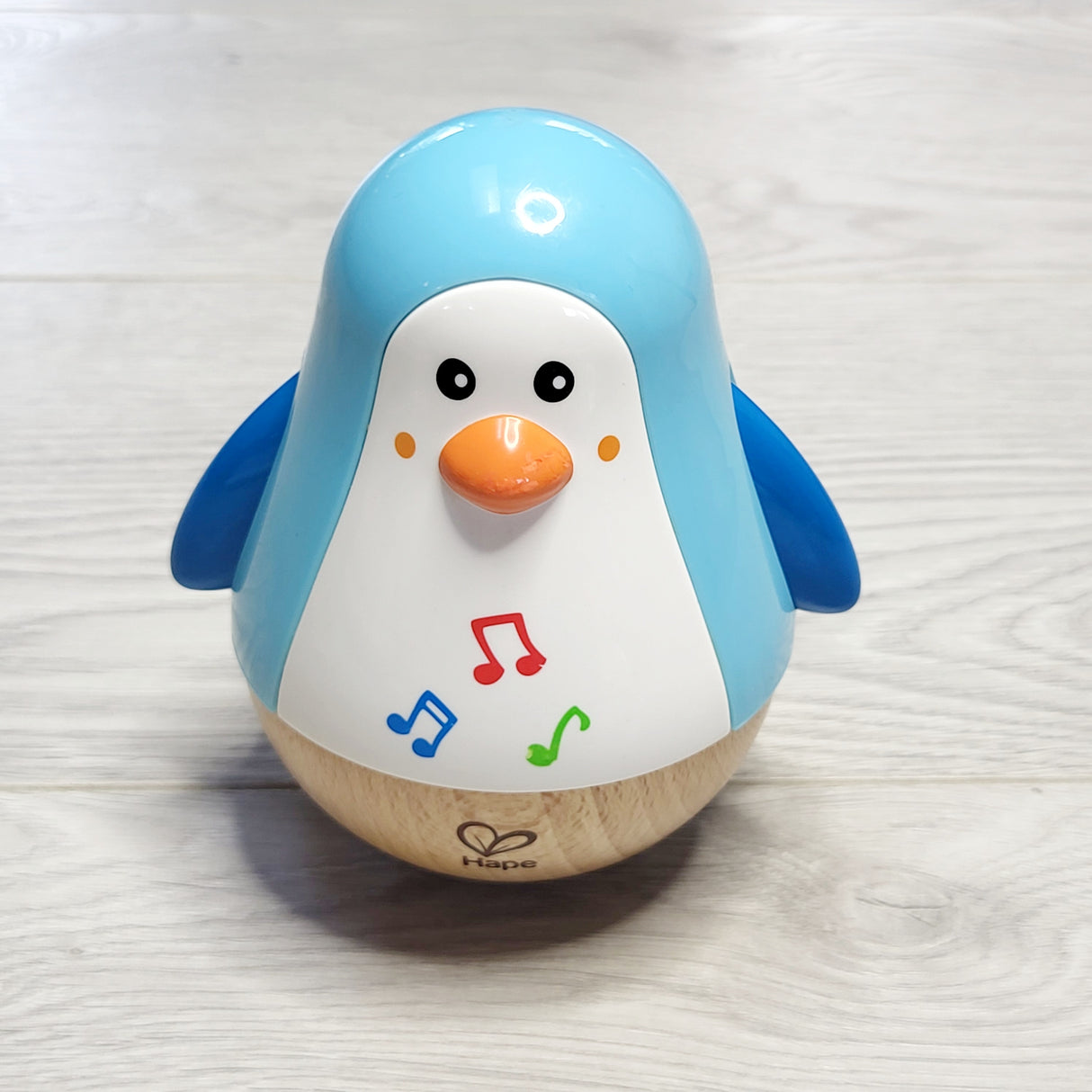GDM12 - Hape Musical Penguin Wobbler toy
