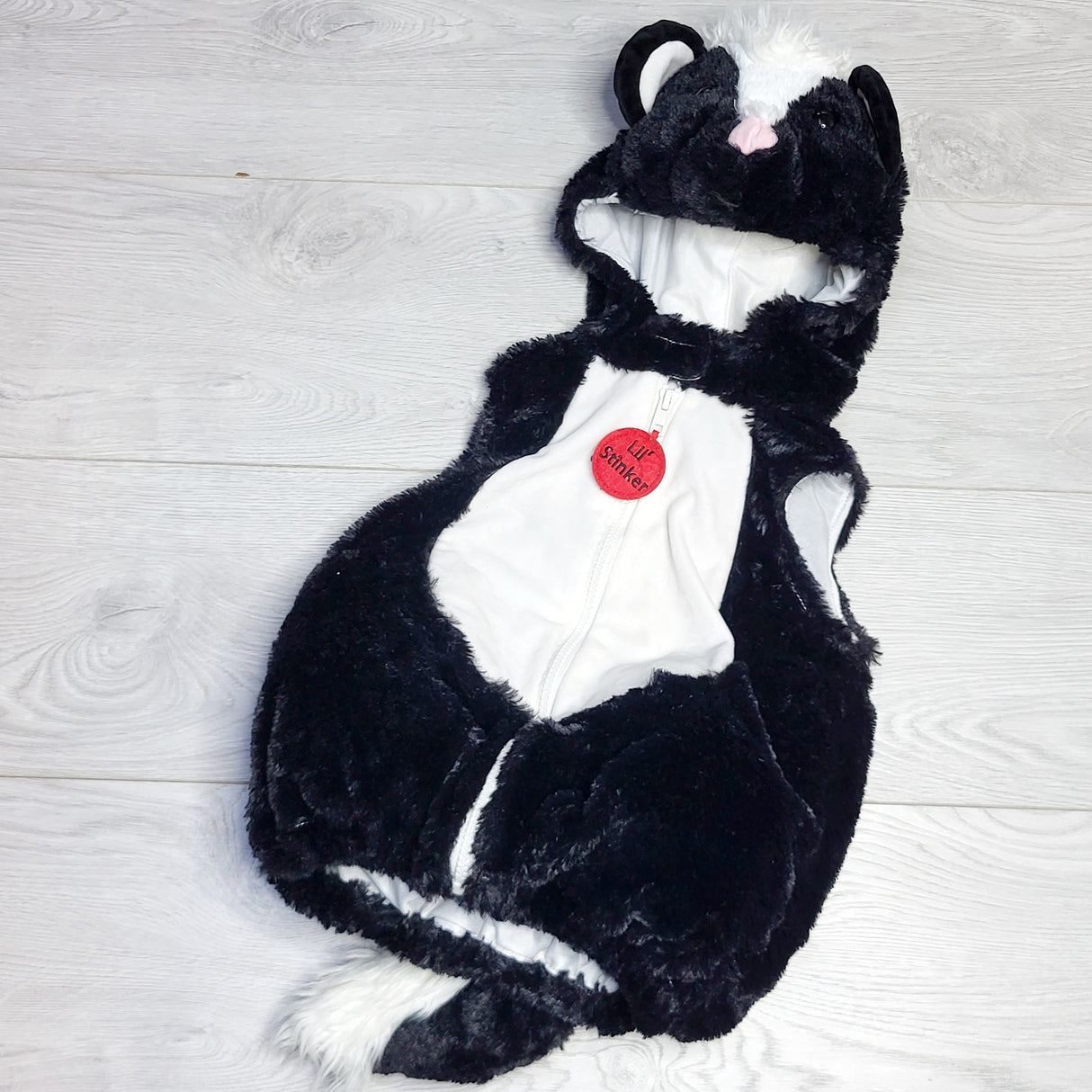 NKLB5 - Humane Society International skunk costume. Size 12 months
