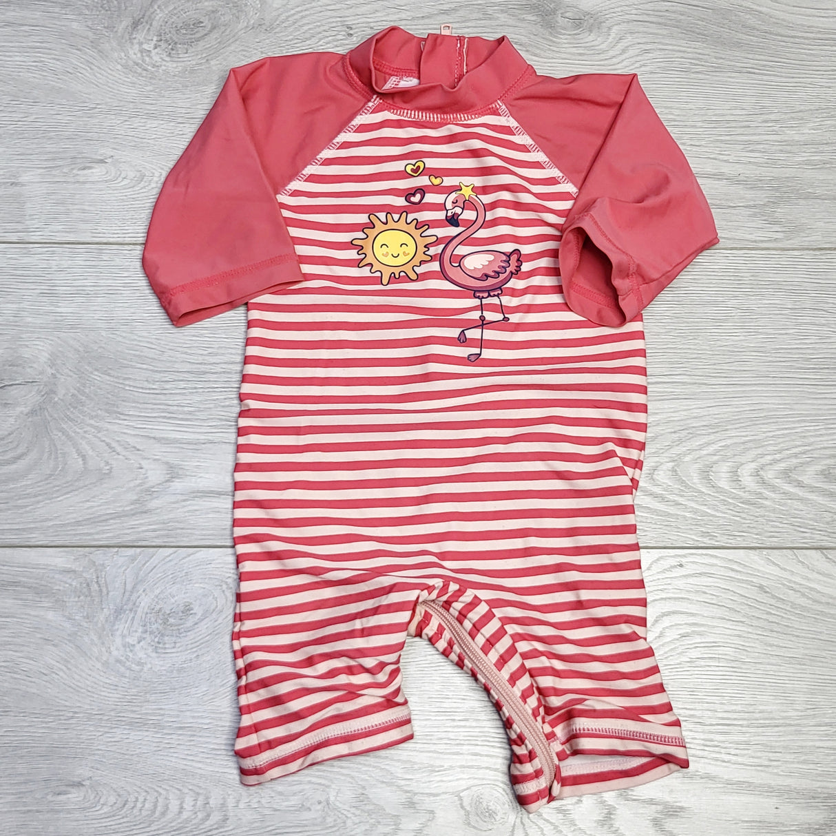 MSNDS1 - Five Oceans pink striped one piee rash guard. Size 18 months