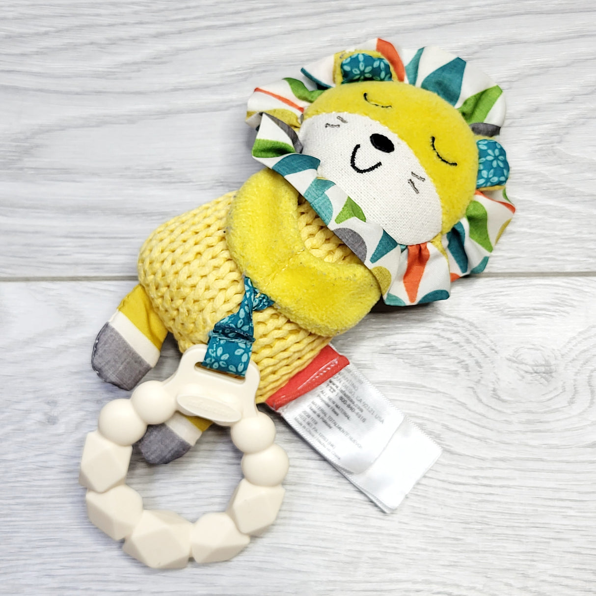 RZA2 - Infantino chime lion toy with teether.
