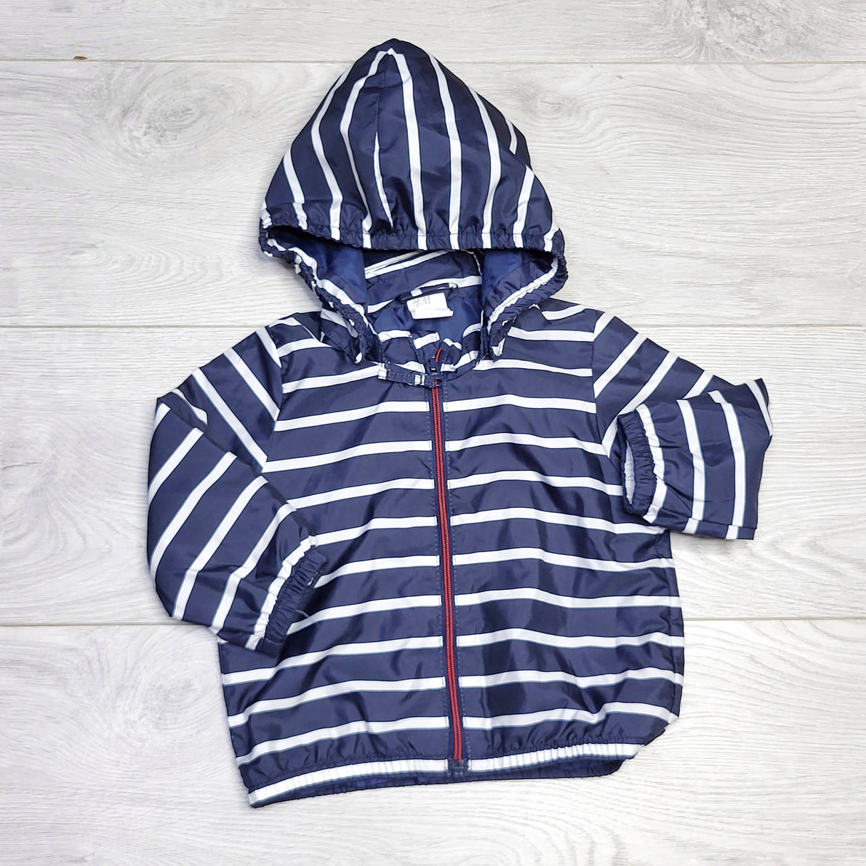 RZA2 - H and M navy striped hooded windbreaker jacket. Size 4-6 months