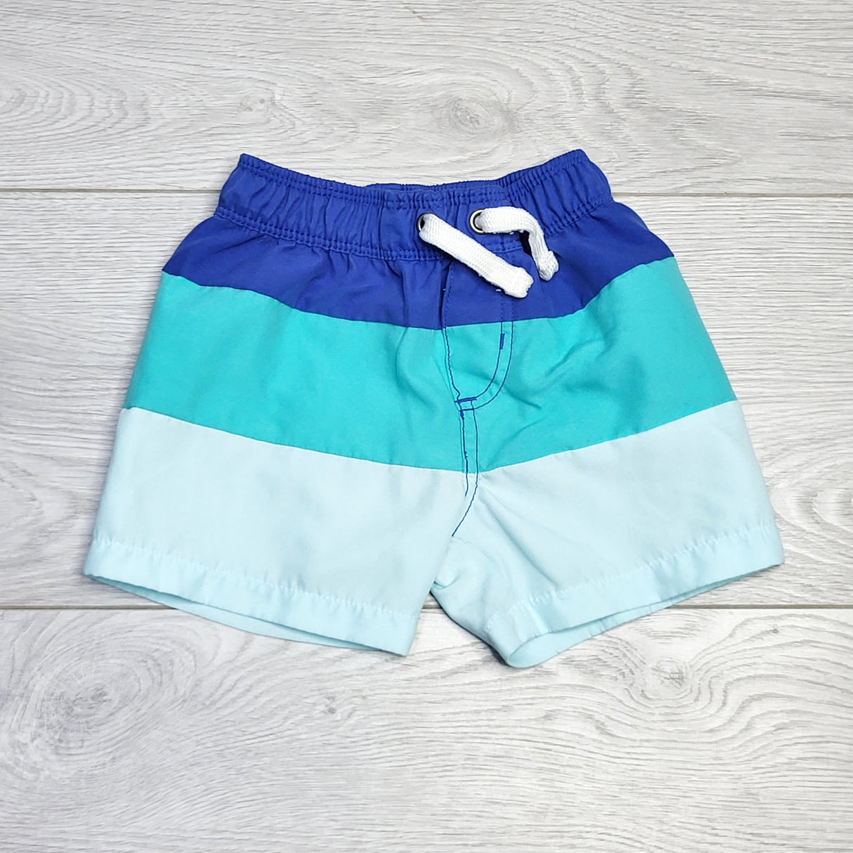 RZA2 - Carters striped swim shorts. Size 9 months