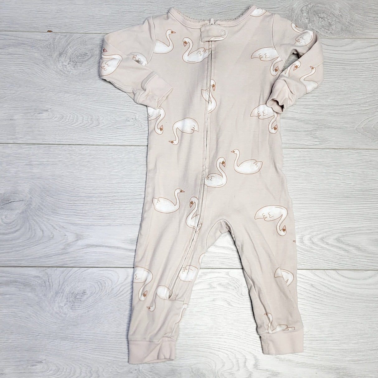 CRTH1 - Carters zippered cotton sleeper with swans. Size 12 months