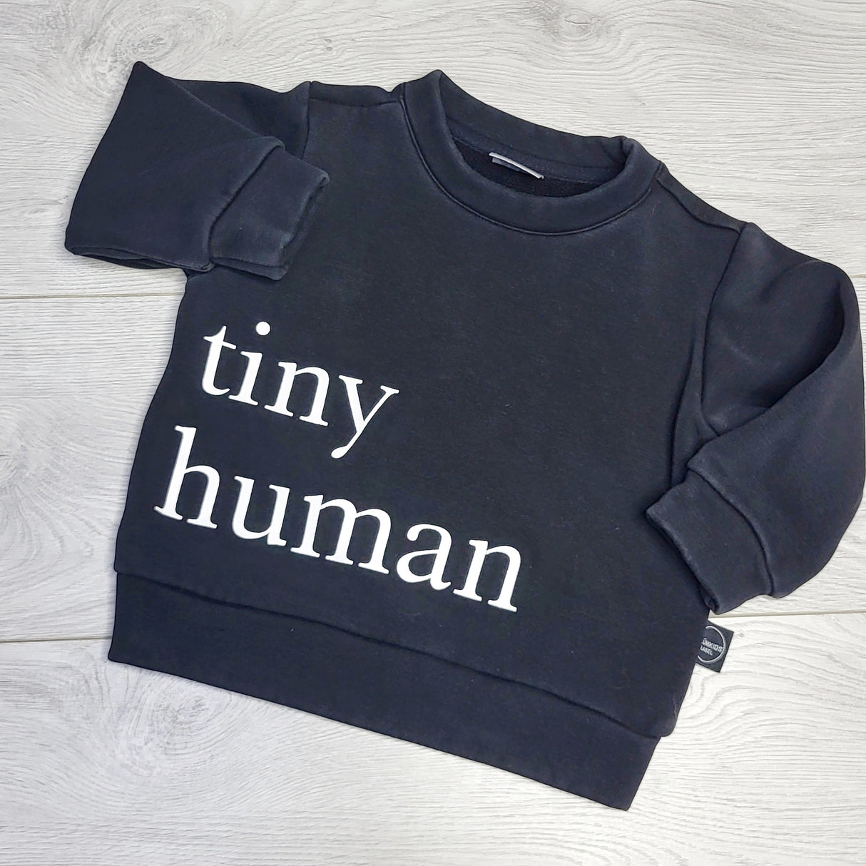 HWIL1 - PlumKids the Label black "Tiny Human" pullover crewneck. Size 12-24 months