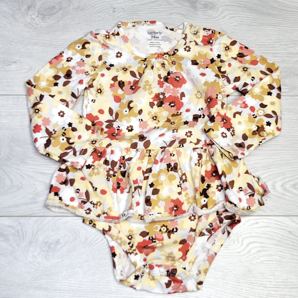 KJHN1 - Carters floral print shirted bodysuit. Size 24 months