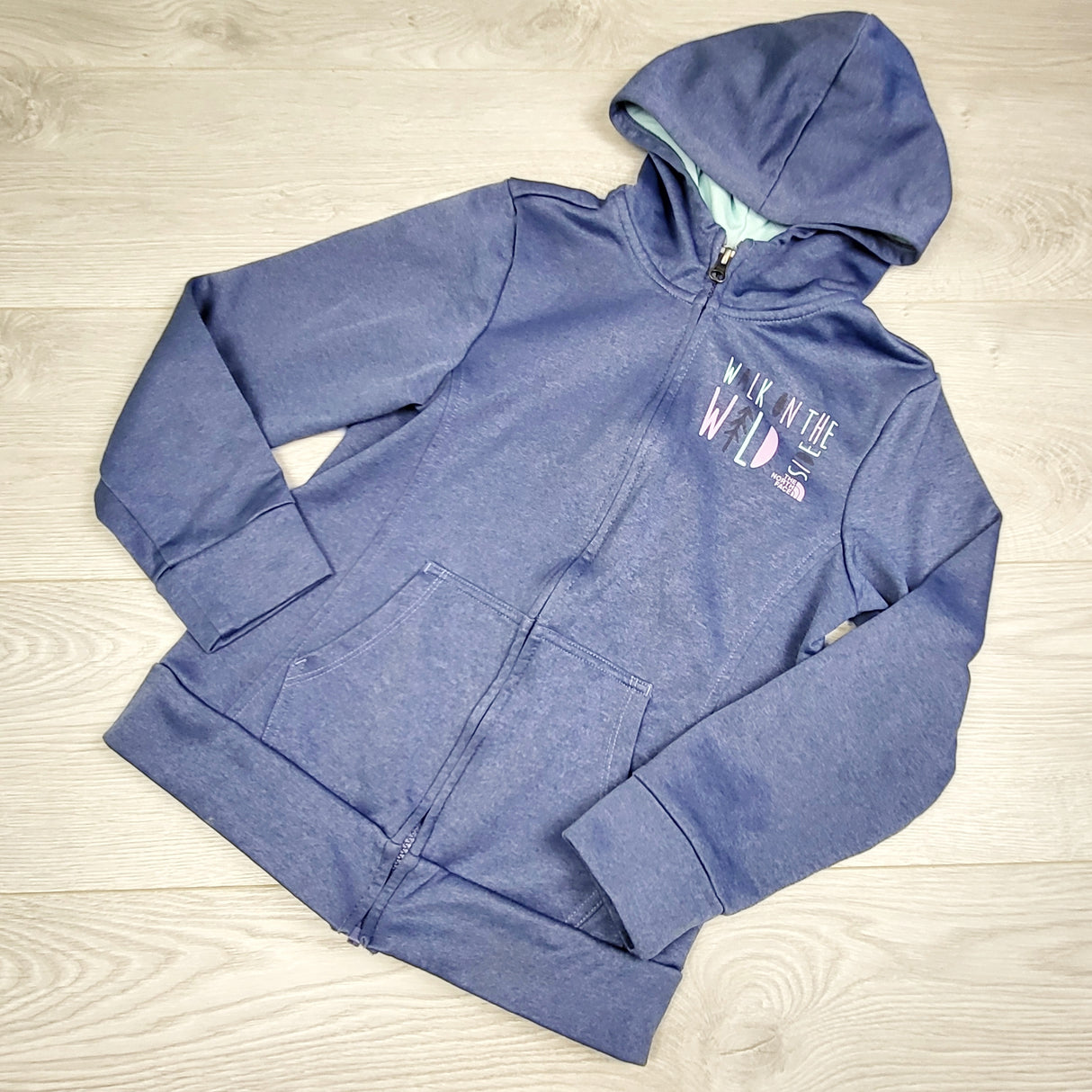 JJSS3 - The North Face blue zip up active hoodie "Walk on the Wild Side." Size 10/12