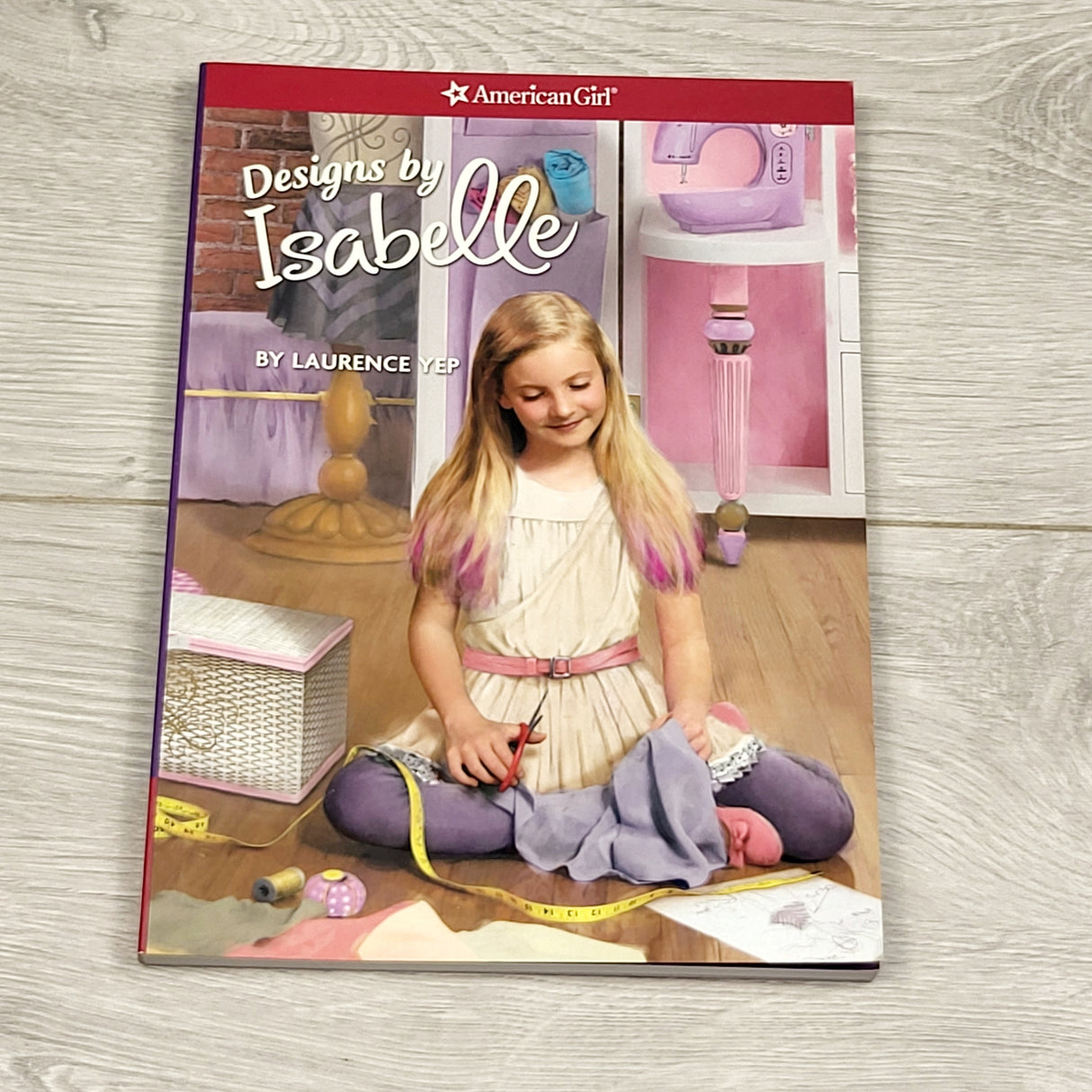 KBRD12 - Designs by Isabelle. Soft cover American Girl chapter book