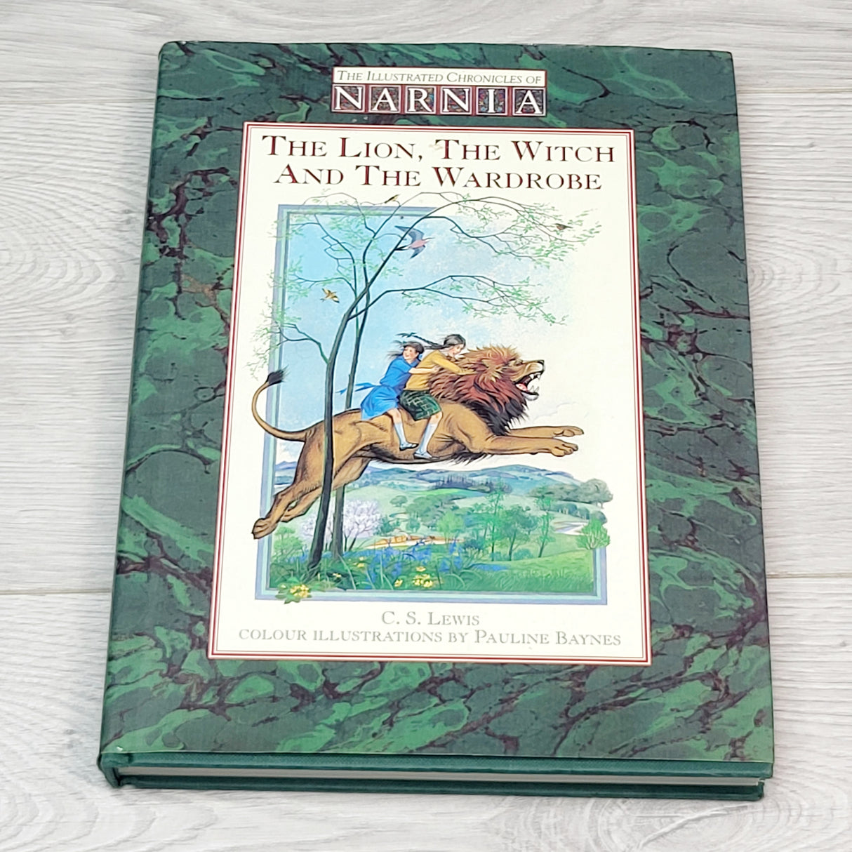 KBRD2 - The Lion, the Witch and the Wardrobe. Hardcover illustrated book. Local pick up or delivery only