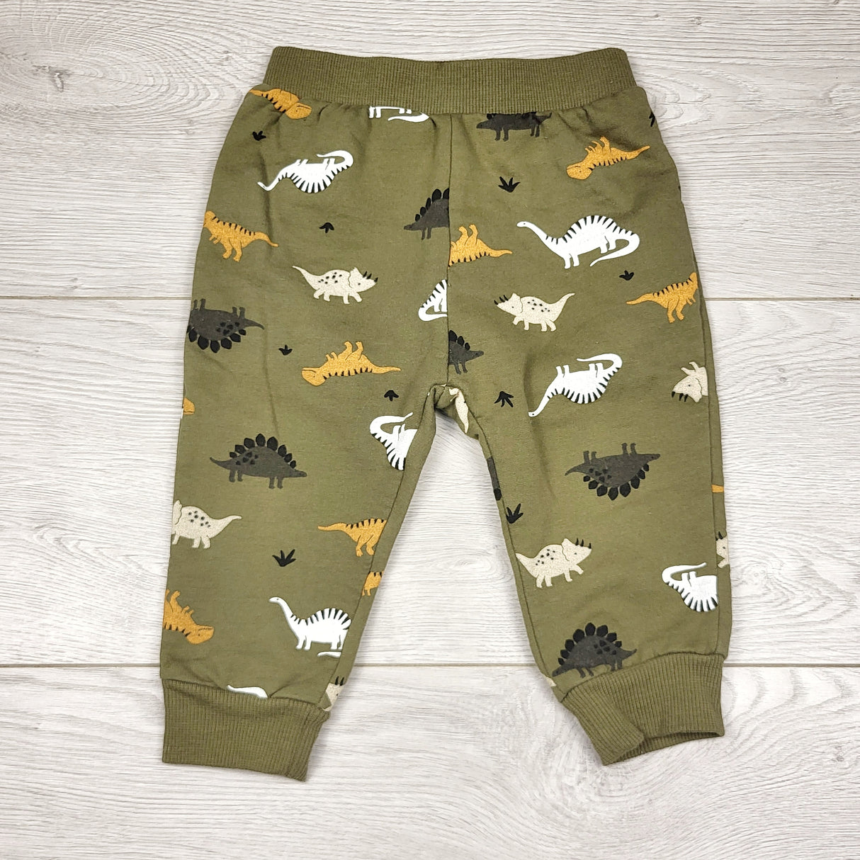 MRSH1 - PL Baby green fleecy lined dinosaur pants. Size 12 months