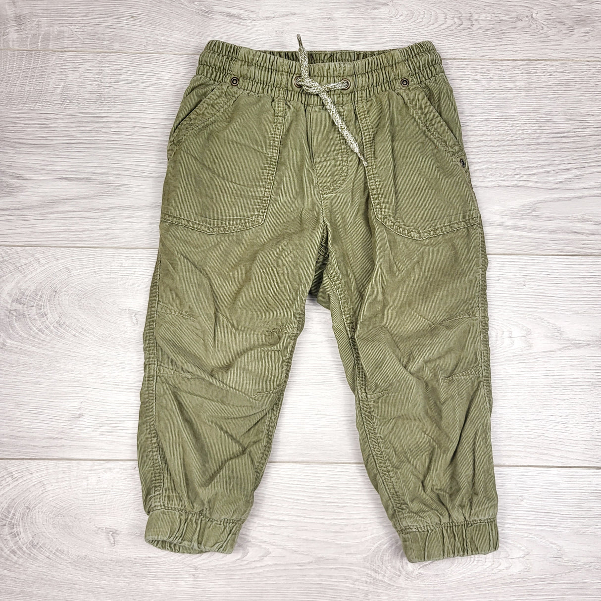 RBEN1 - H and M green jersey lined drawstring corduroy pants. Size 12-18 months