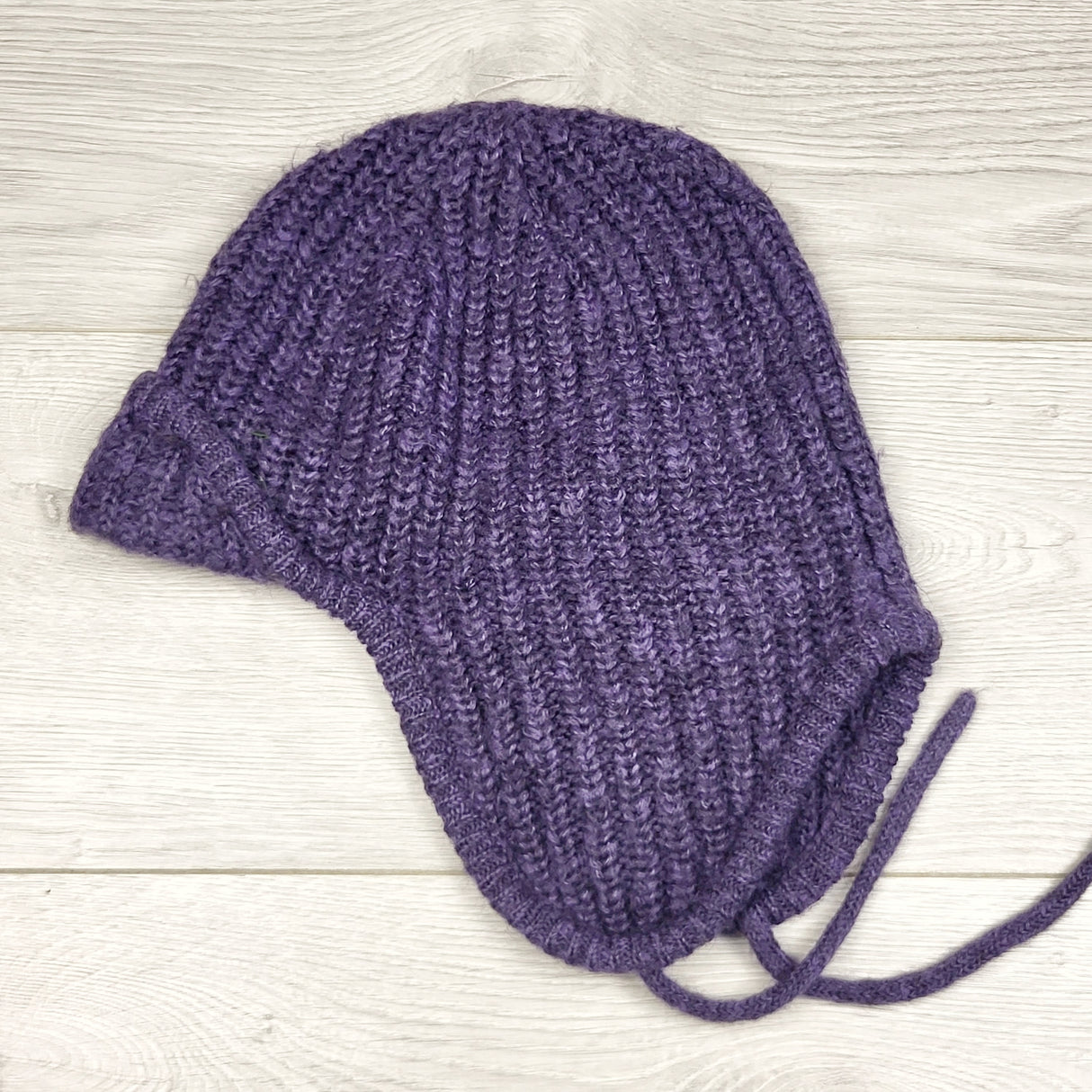 RBEN1 - Nine West purple ear flap hat. For adults or older kids