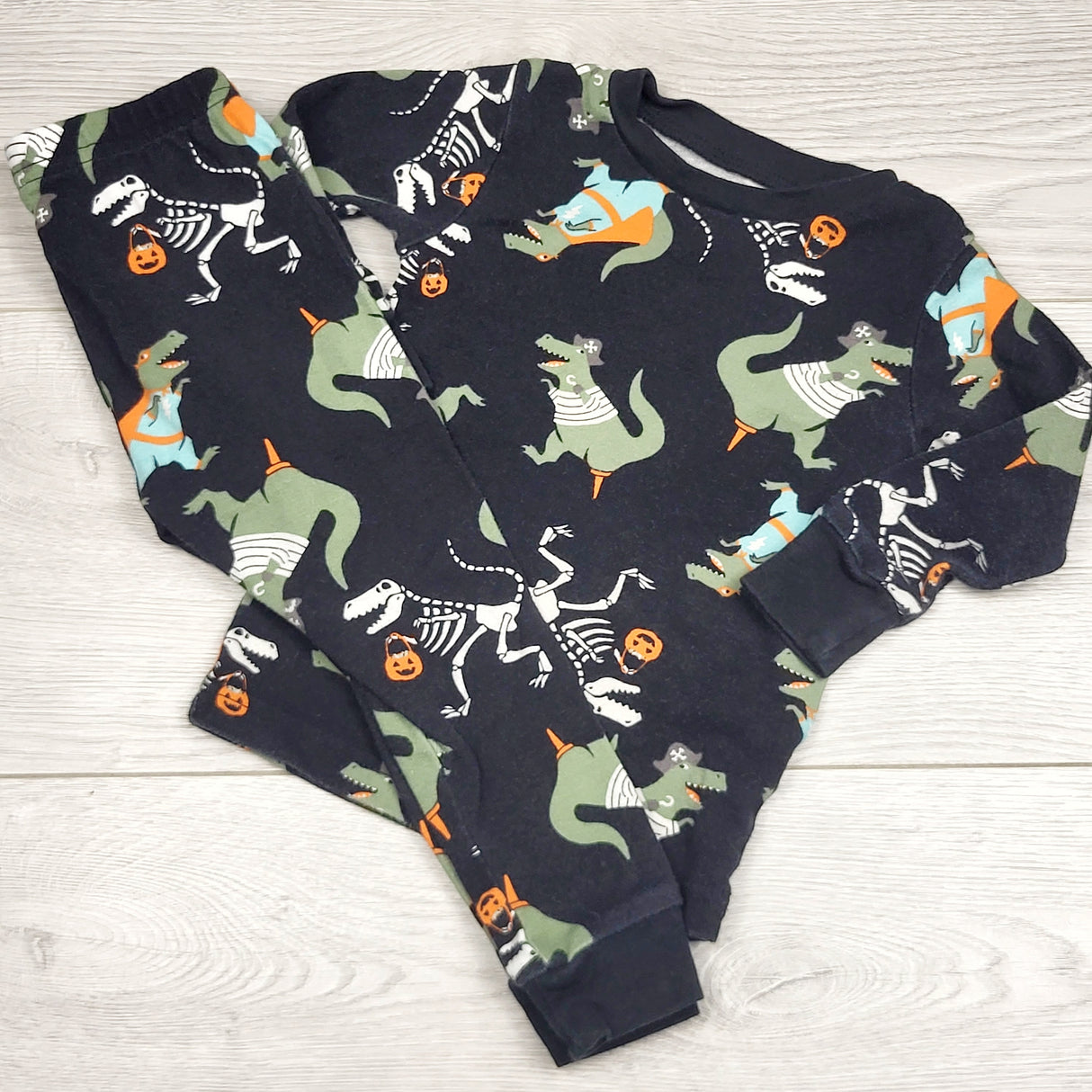 RBEN2 - Just One You black 2pc Halloween PJs with dinosaurs. Size 18 months