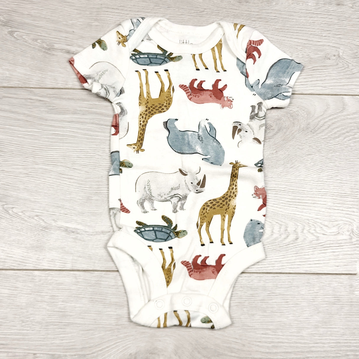 KWTT2 - Little Planet white bodysuit with animals. Size newborn size