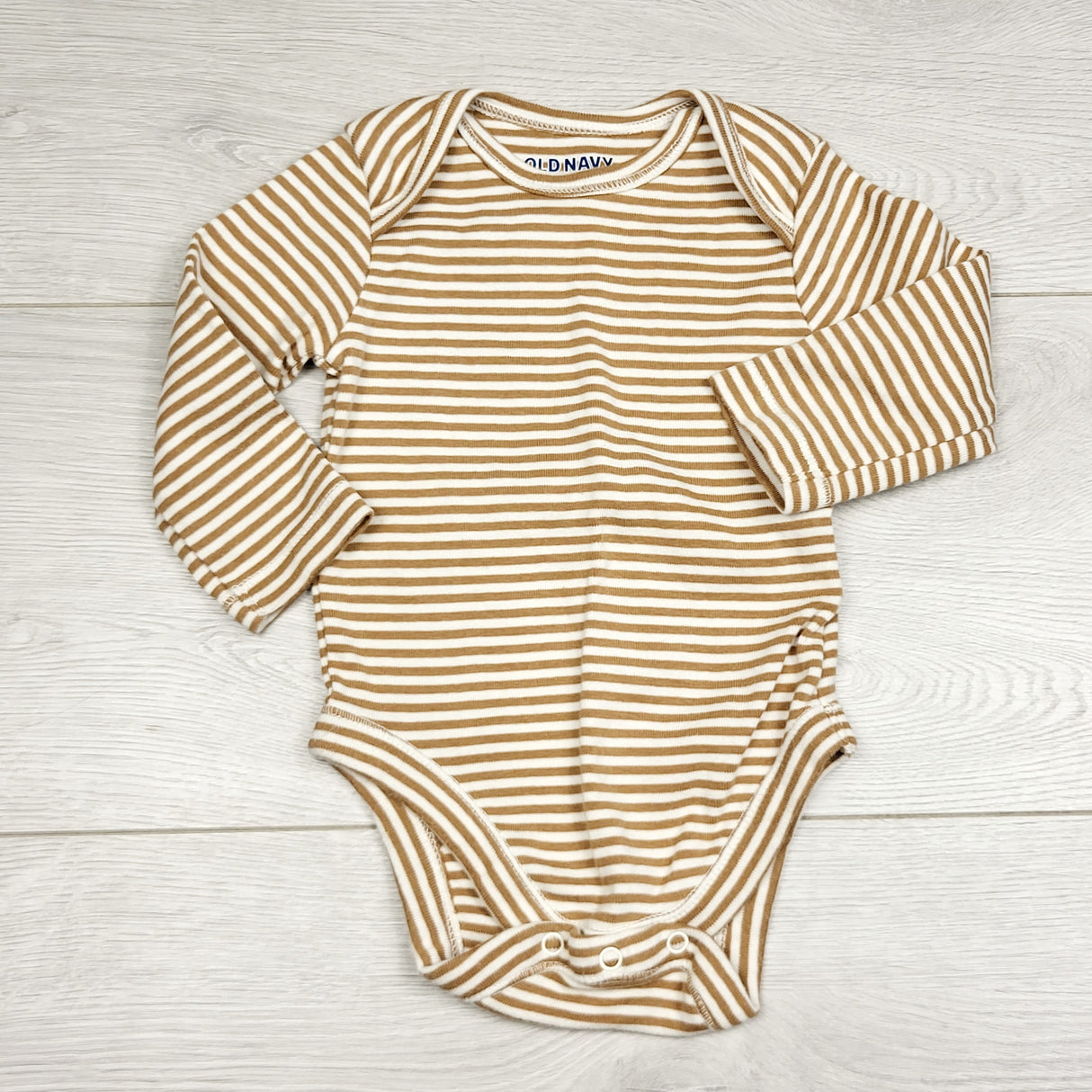 KWTT2 - Old Navy beige striped long sleeved bodysuit. Size 0-3 months