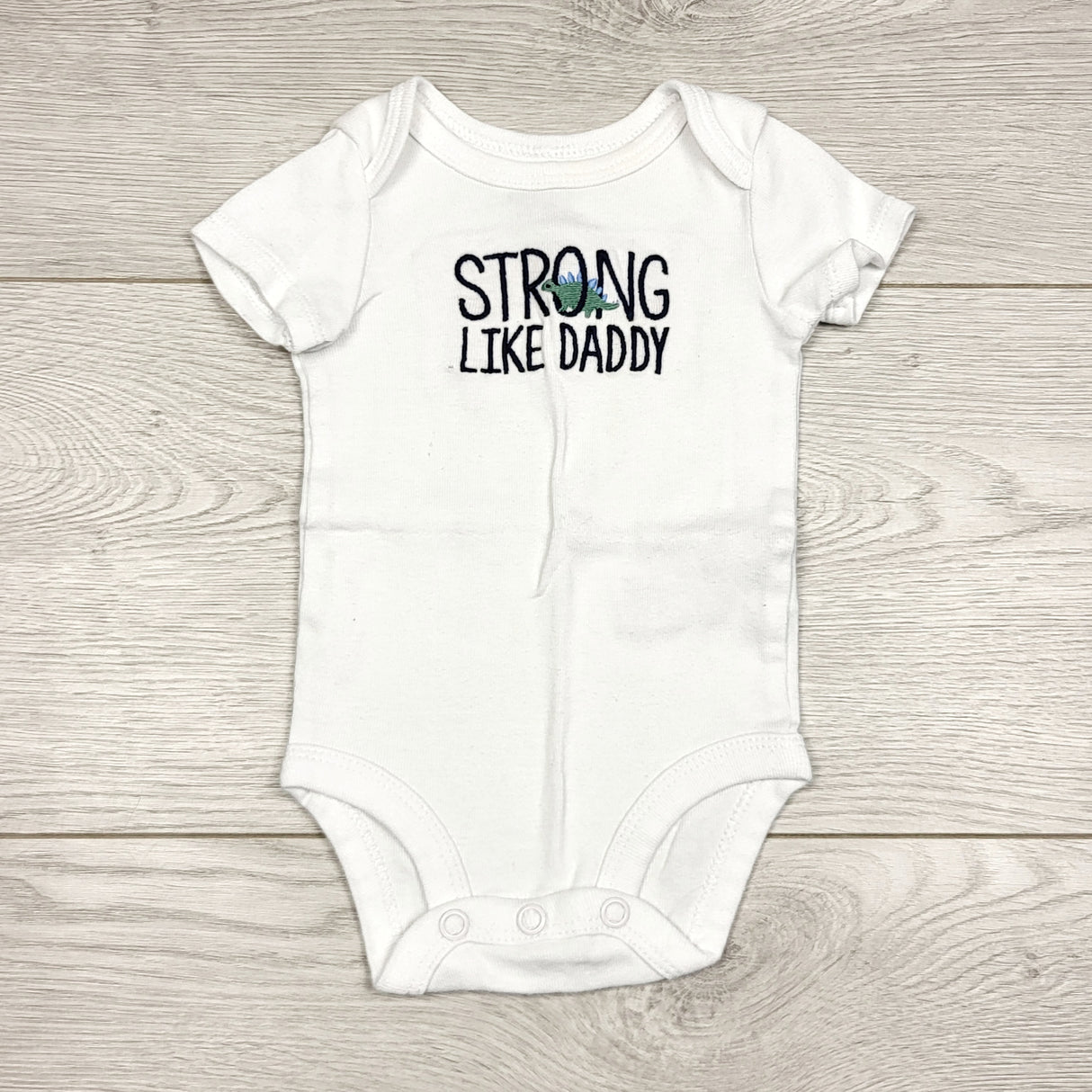 KWTT22 - Child of Mine white "Strong Like Daddy" bodysuit. Newborn size