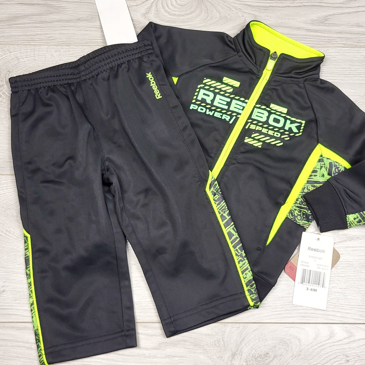 KWTT22 - NEW - Reebok black 2pc tracksuit. Size 3-6 months