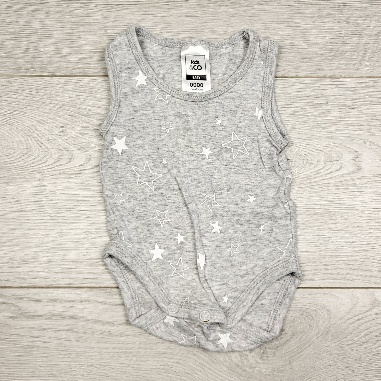 KWTT22 - Kids and Co. grey tank bodysuit with stars. Newborn size