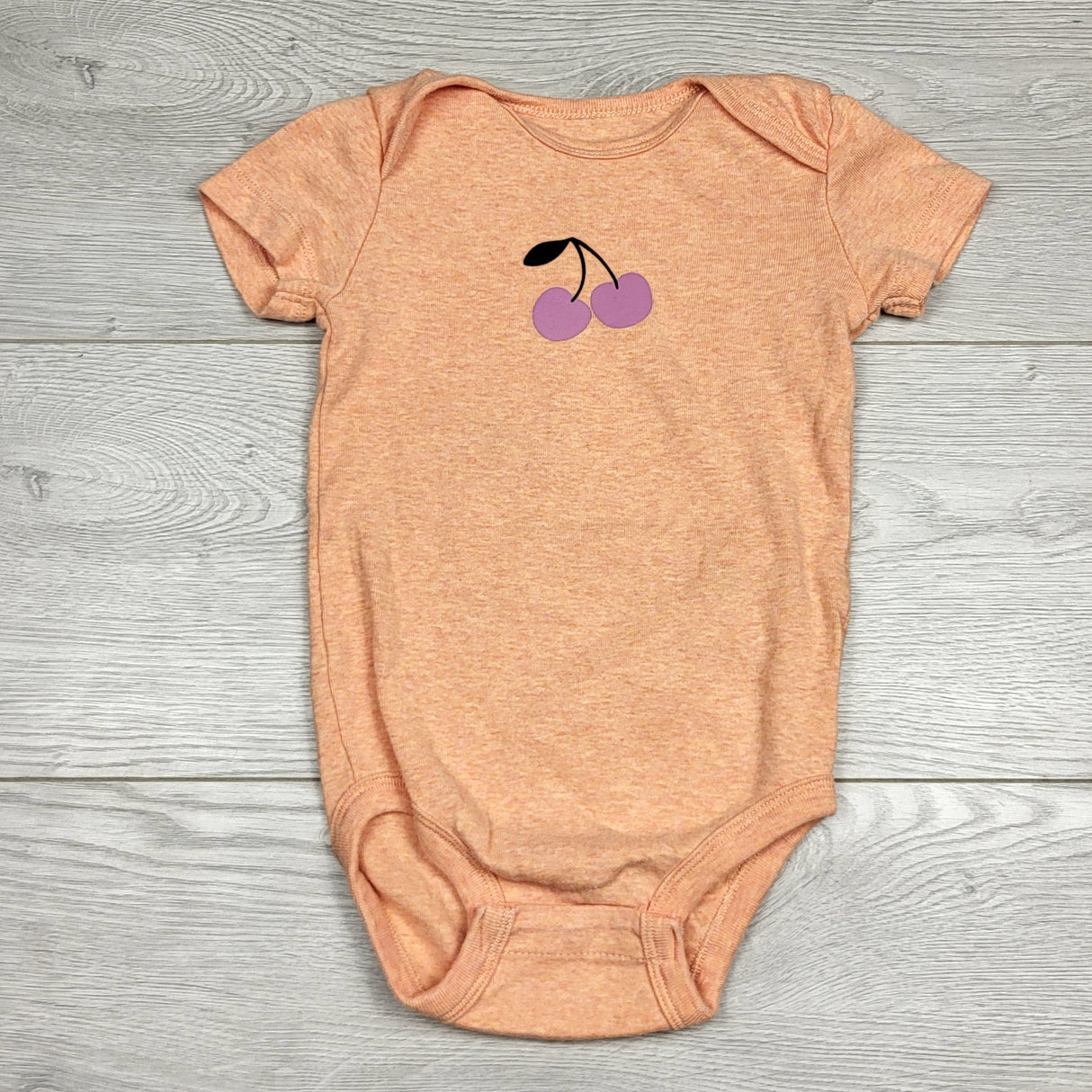 MBLK1 - Pekkle peach coloured bodysuit with cherries. Size 18 months