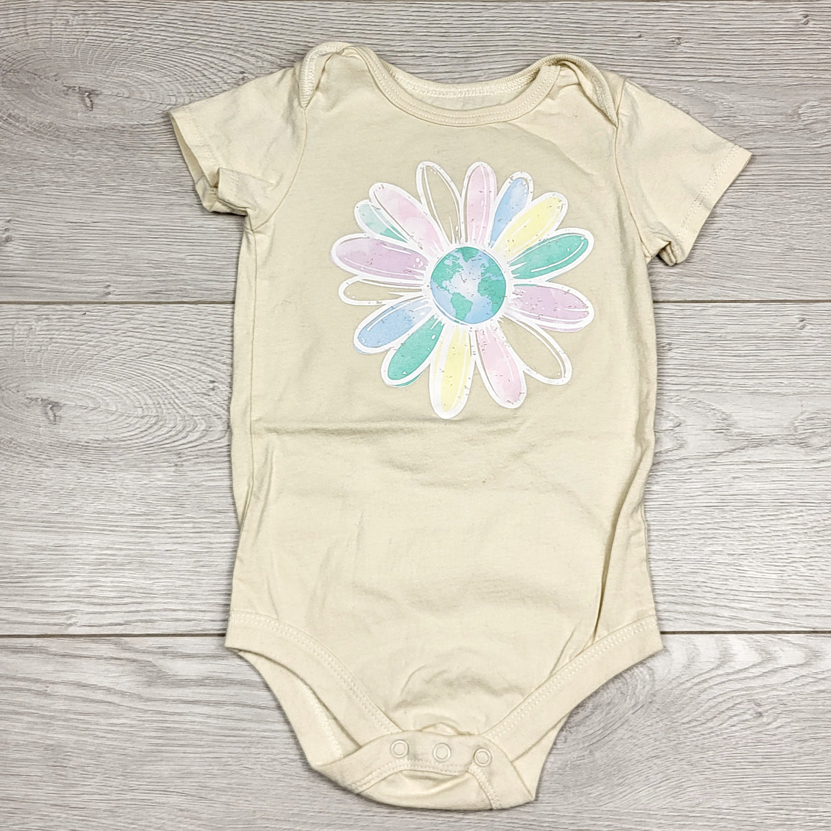 MBLK1 - George beige bodysuit with flower. Size 12-18 months