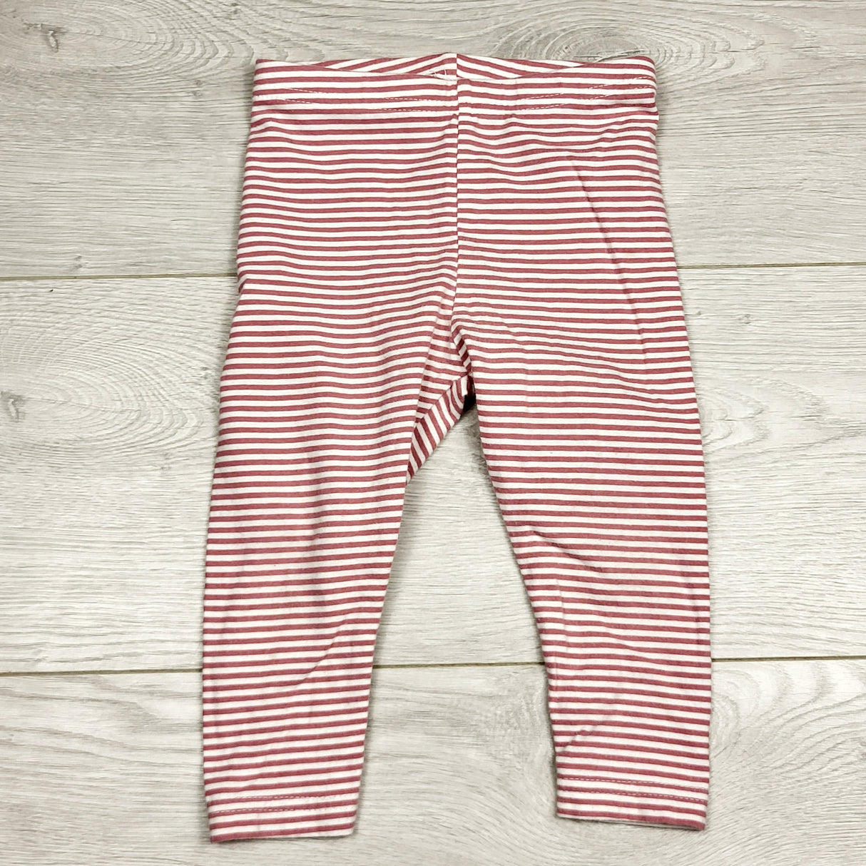 MBLK1 - Carters pink striped leggings. Size 12 months