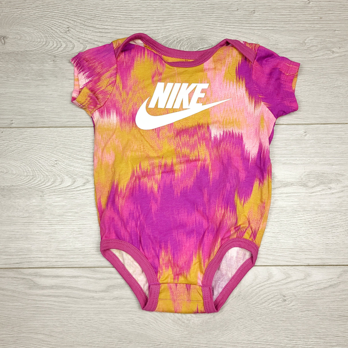 MBLK1 - Nike tie-dye bodysuit. Size 12 months