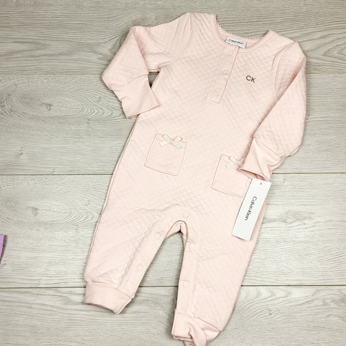 MBLK1 - NEW - Calvin Klein pink quilted sleeper. Size 6-9 months