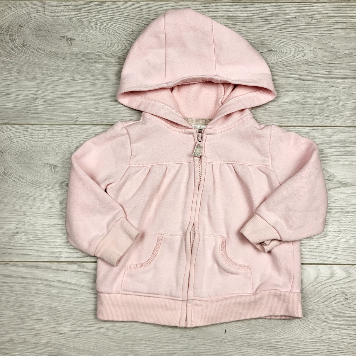 MBLK11 - Carters pink fleecy lined zip up hoodie. Size 12 months