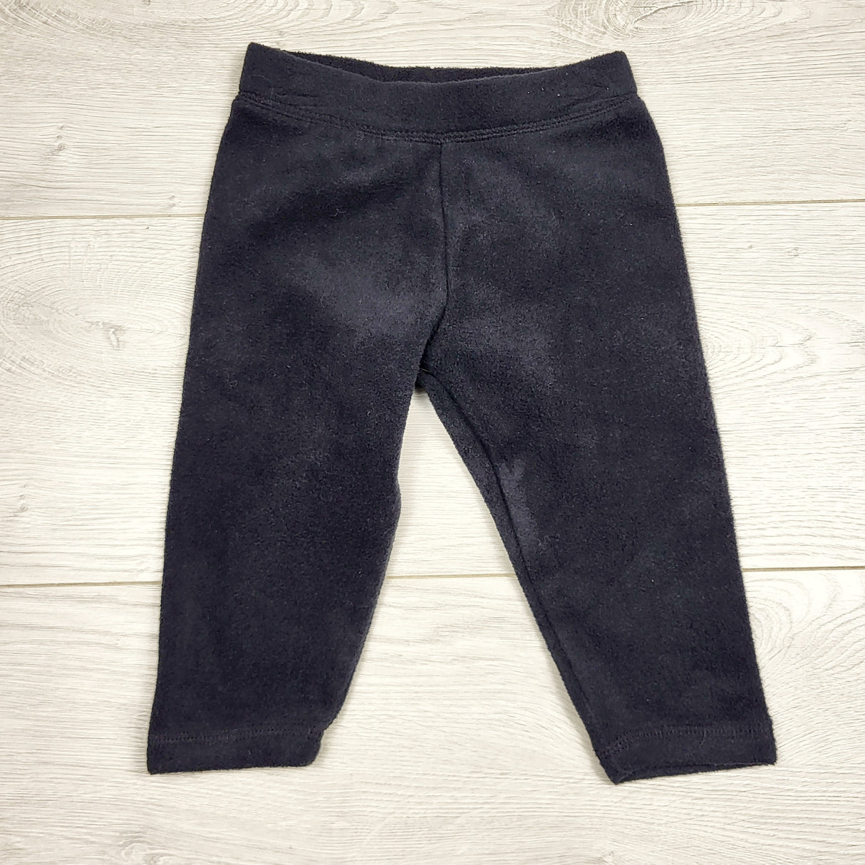 MBLK11 - Carters black fleece leggings. Size 12 months