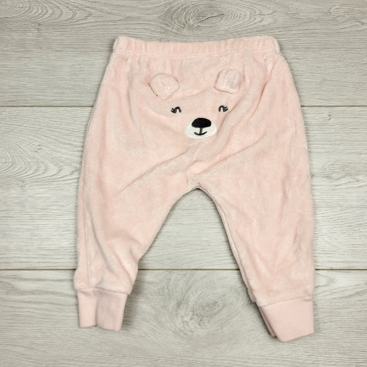 MBLK11 - Carters pink terrycloth pants with bear bum. Size 6 months