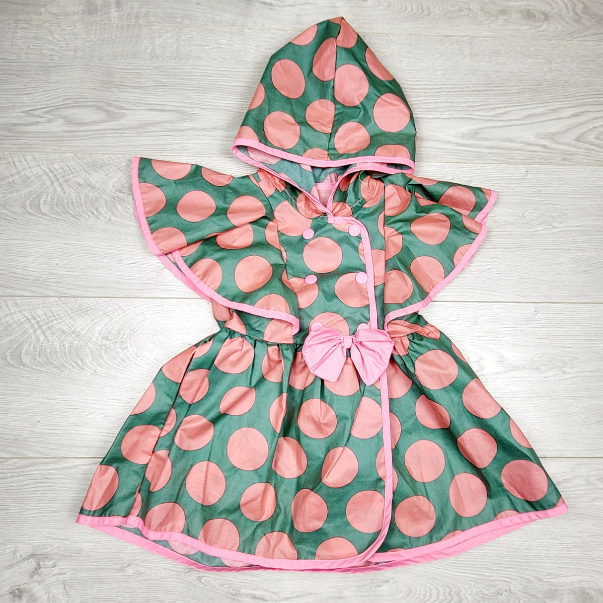 AKUR11- Cocomo Kids pink and green polka dot hooded rain coat. Approx 4/5T