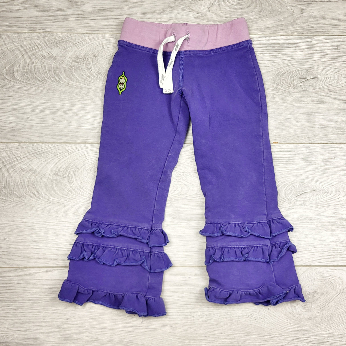 JFLM2 - Peekaboo Beans purple ruffle pants. Size 2T