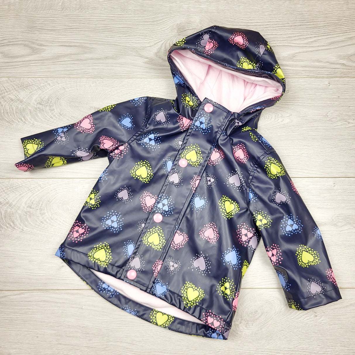 MBLK22 - Joe navy fleece lined hooded rain jacket with hearts. Size 6-12 months