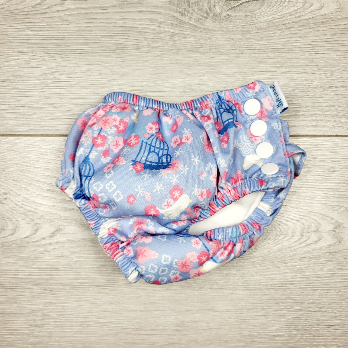 MBLK22 - iPlay blue floral print swim diaper. Size 6 months