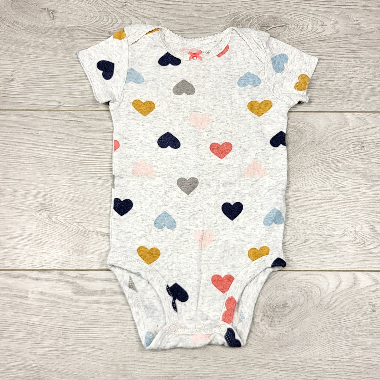 KWTT24 - Carters grey bodysuit with hearts. Size 6 months