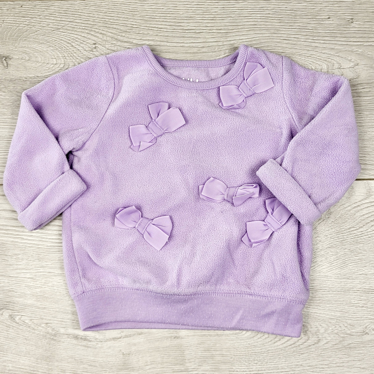 KWTT24 - Child of Mine purple fleece sweatshirt with bows. Size 0-3 months