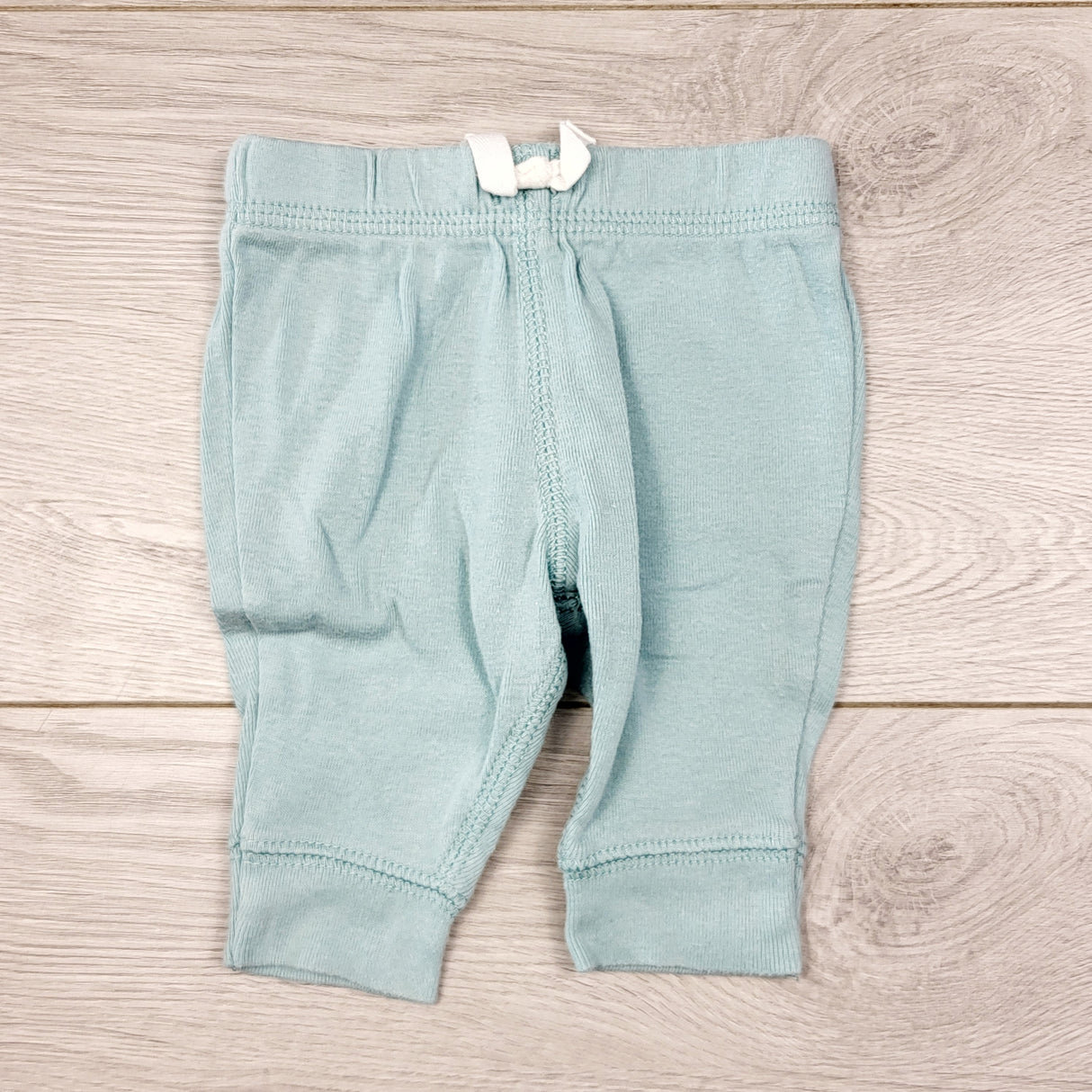 KWTT24 - Carters aqua coloured cotton pants. Newborn size