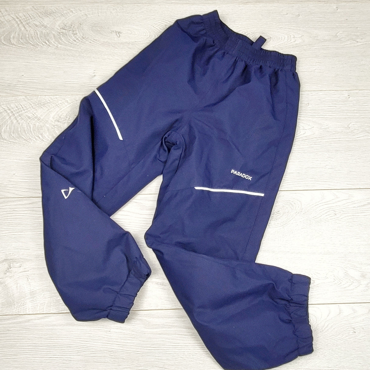 ESZ1 - Paradox navy jersey lined rain pants. Size 4/5T