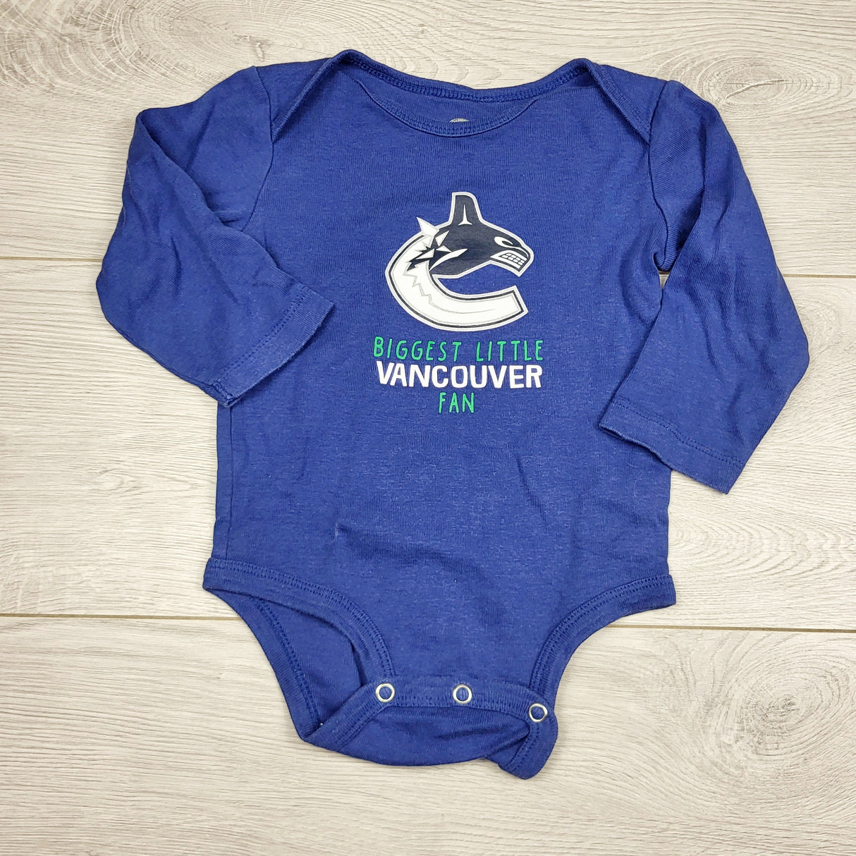 ECRS11 - NHL blue Vancouver Canucks bodysuit. Size 12 months