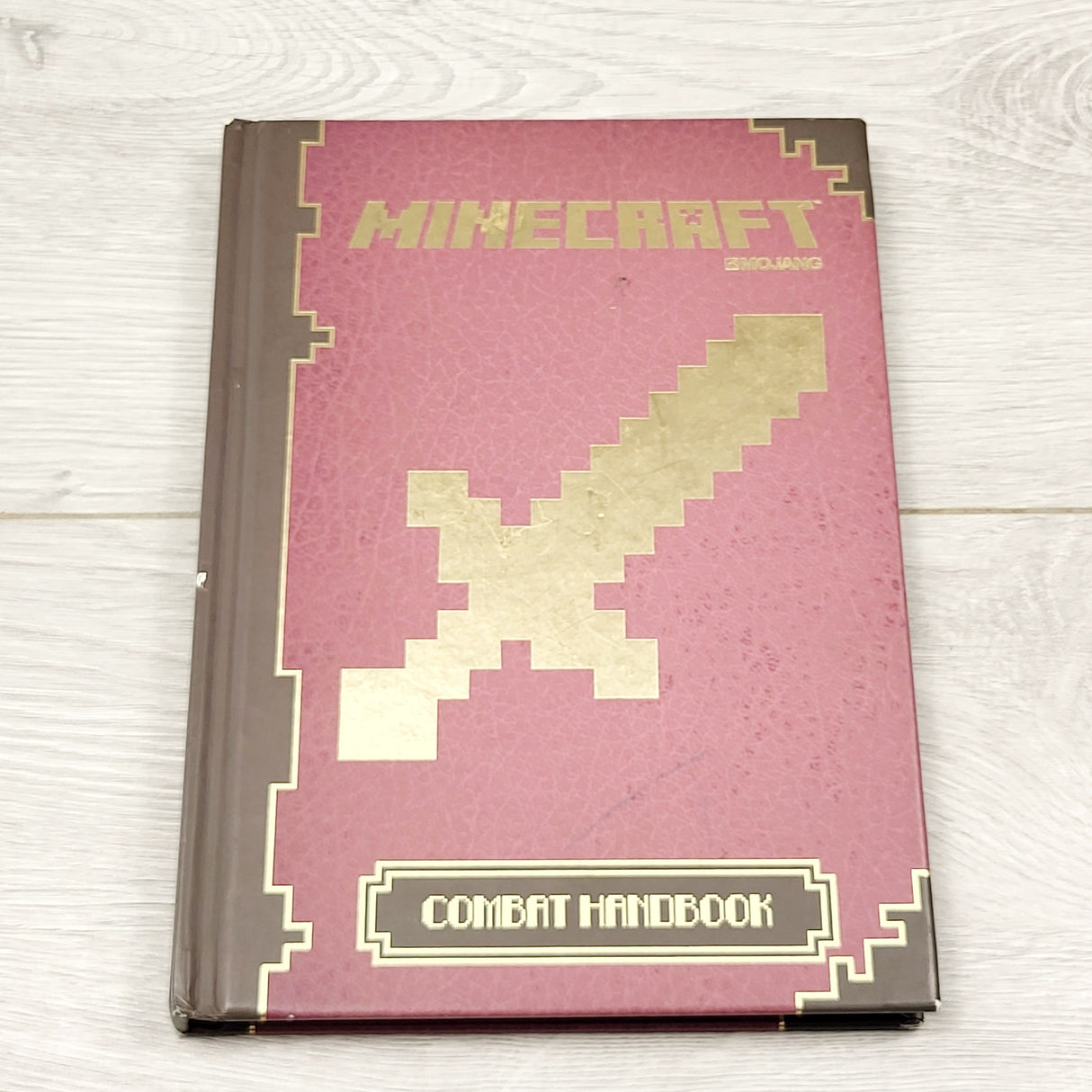 ZPXT3 - Minecraft Combat Handbook. Hardcover book