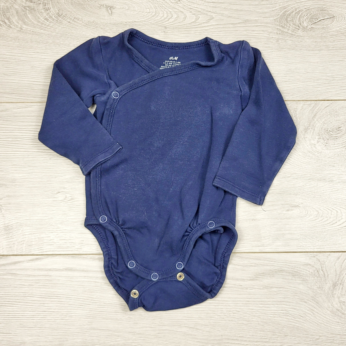 ECRS2 - H and M navy wrap style bodysuit. Size 4-6 months