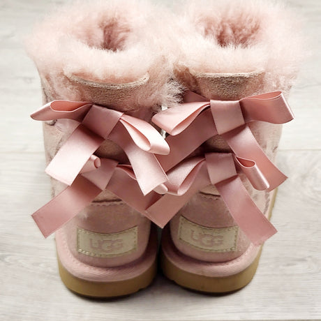 MHAN3 - Ugg light pink Bailey Bow sheepskin boots. Size 9