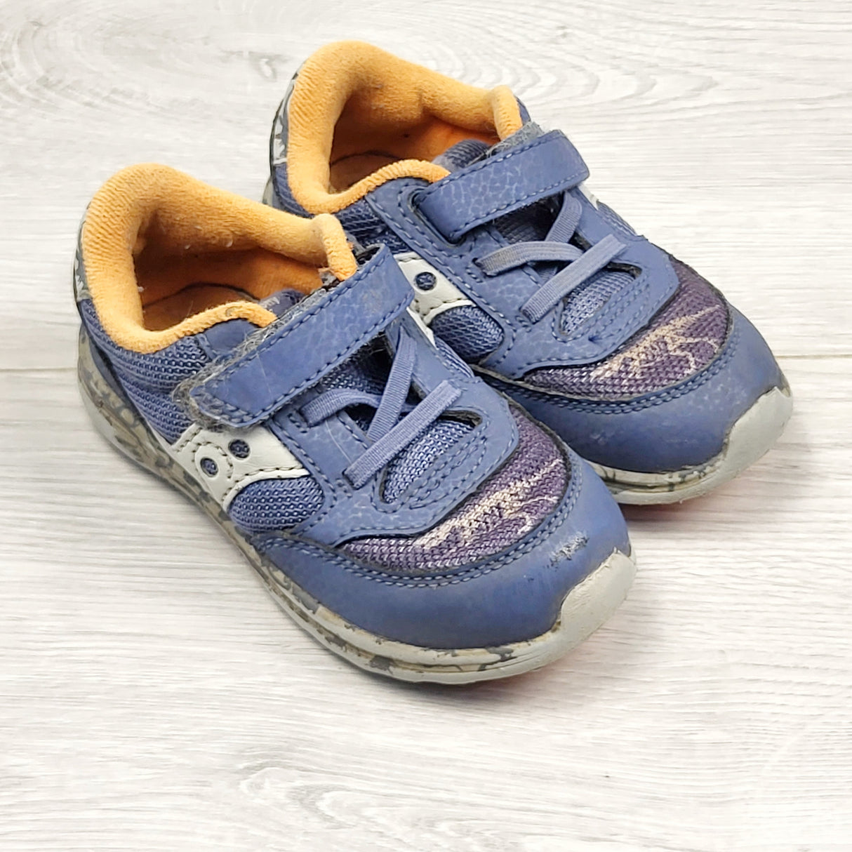 RMAZ1 - Saucony blue and orange running shoes. Size 7M