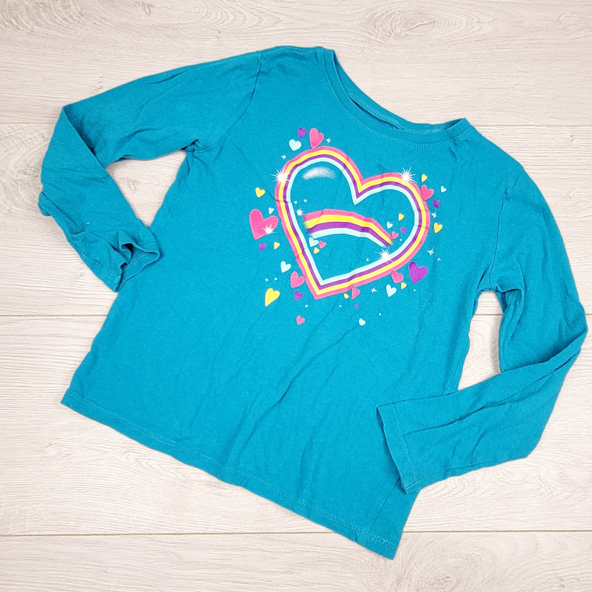 RMAZ2 - Children's Place teal long sleeved top with rainbow heart. Size 5/6