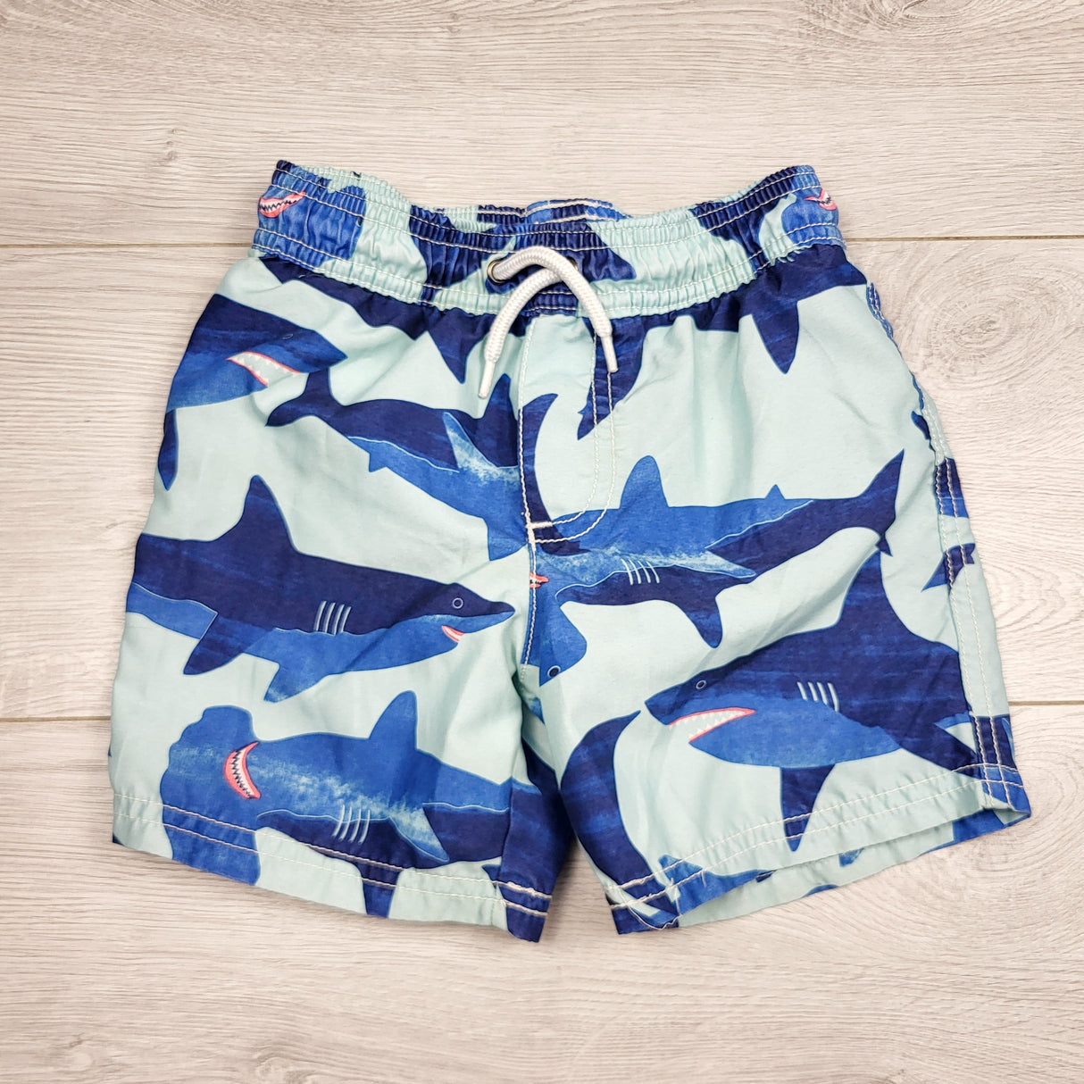 RMAZ22 - Carters mesh lined swim shorts with sharks. Size 3T