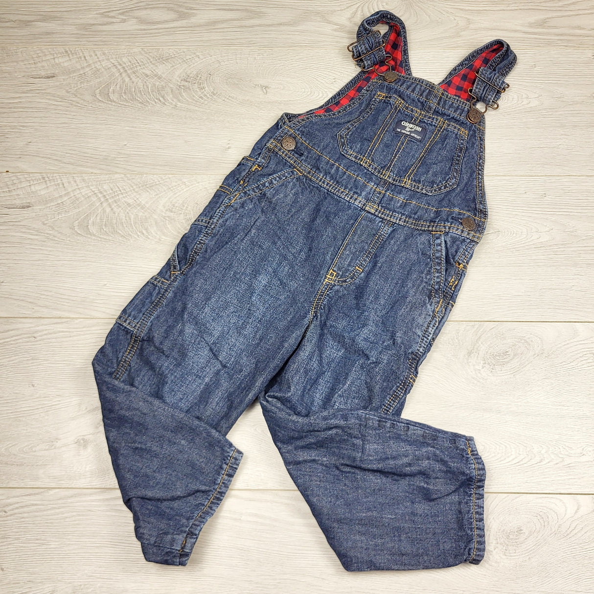 RMAZ22 - Oshkosh plaid lined denim overalls. Size 4T